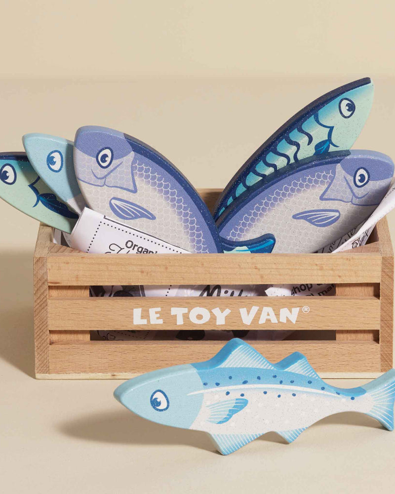 Le Toy Van wooden fish crate with multiple seafood pieces for market pretend play