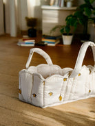 Charming wicker baby bassinet inspiring nurturing pretend play