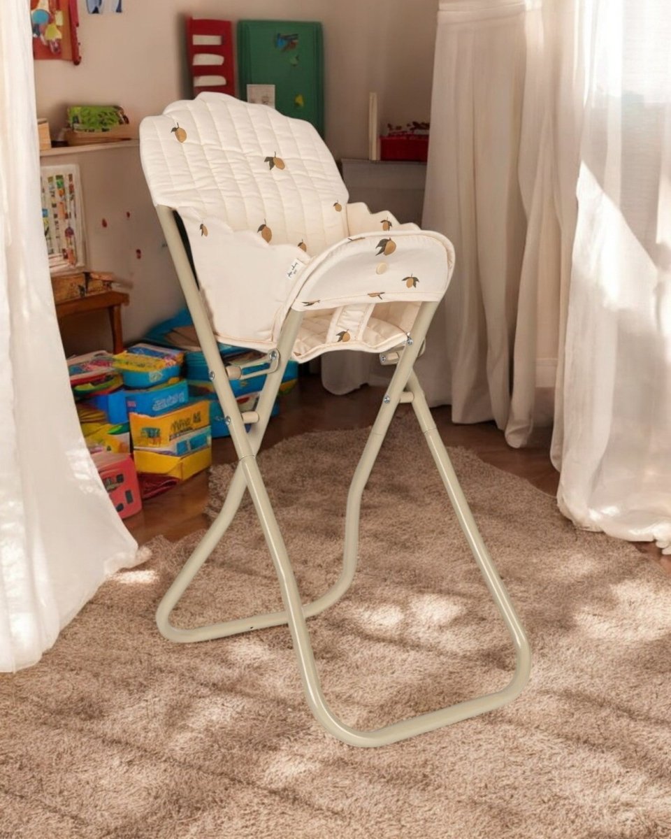 Miniature baby doll high chair with safety harness for nurturing play scenarios