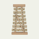 Wooden lemon print xylophone with sage green bars and natural wood mallet on white background