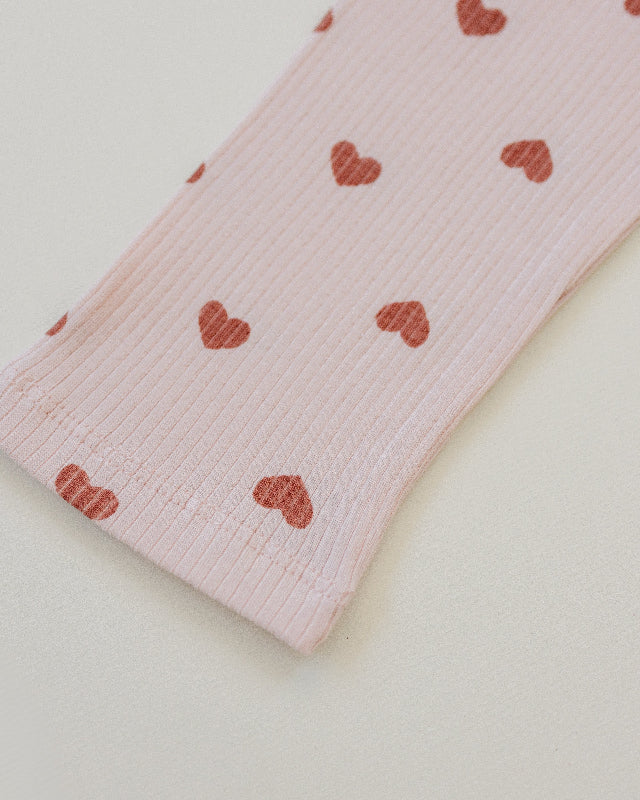 High-quality cotton spandex children's comfort wear in pink with mauve heart pattern