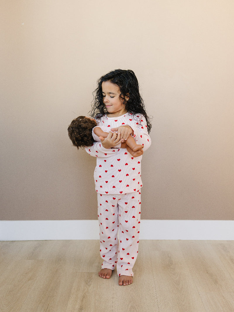 Young child wearing premium Korean-made ribbed set in Valentine Rose Hearts print