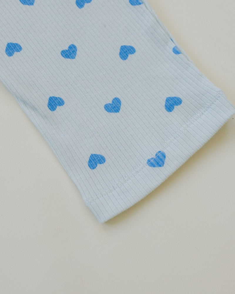 Stretchy cotton spandex kids comfort wear in soft pink with blue heart design