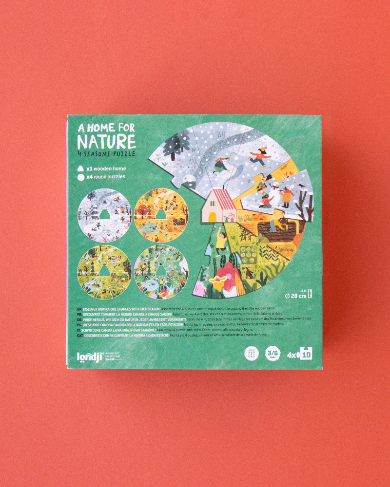 Green packaging box with nature-themed illustrations on a red background