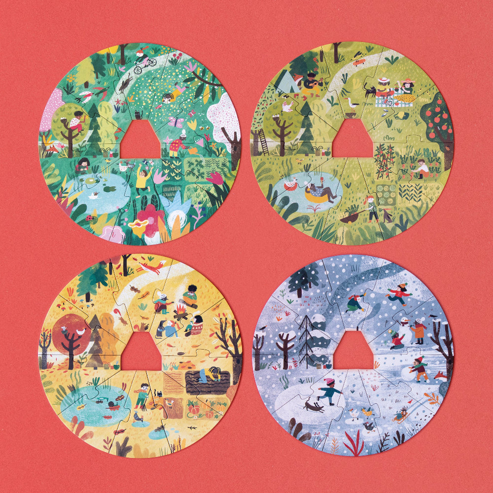 Four circular puzzles with different seasonal scenes on a pink background
