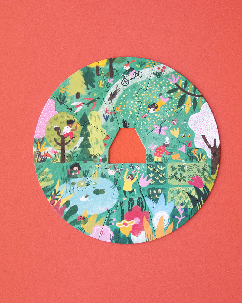 Circular cutout with colorful illustrations on a red background