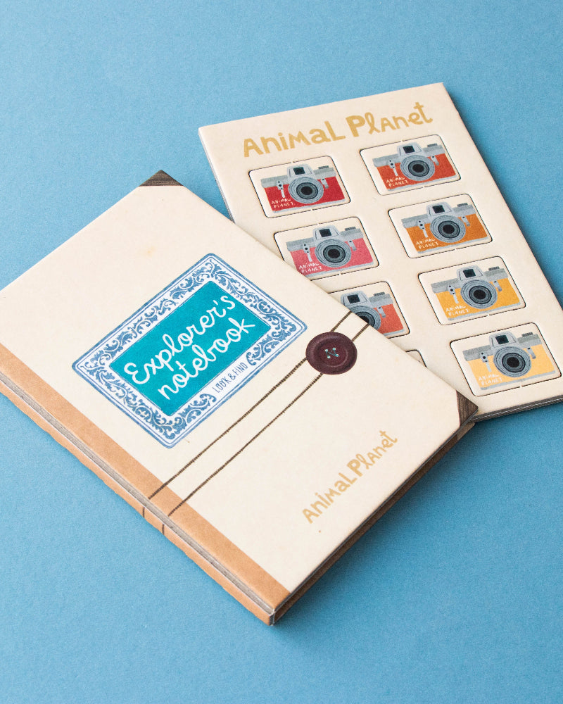 Notebook with stickers on a blue background