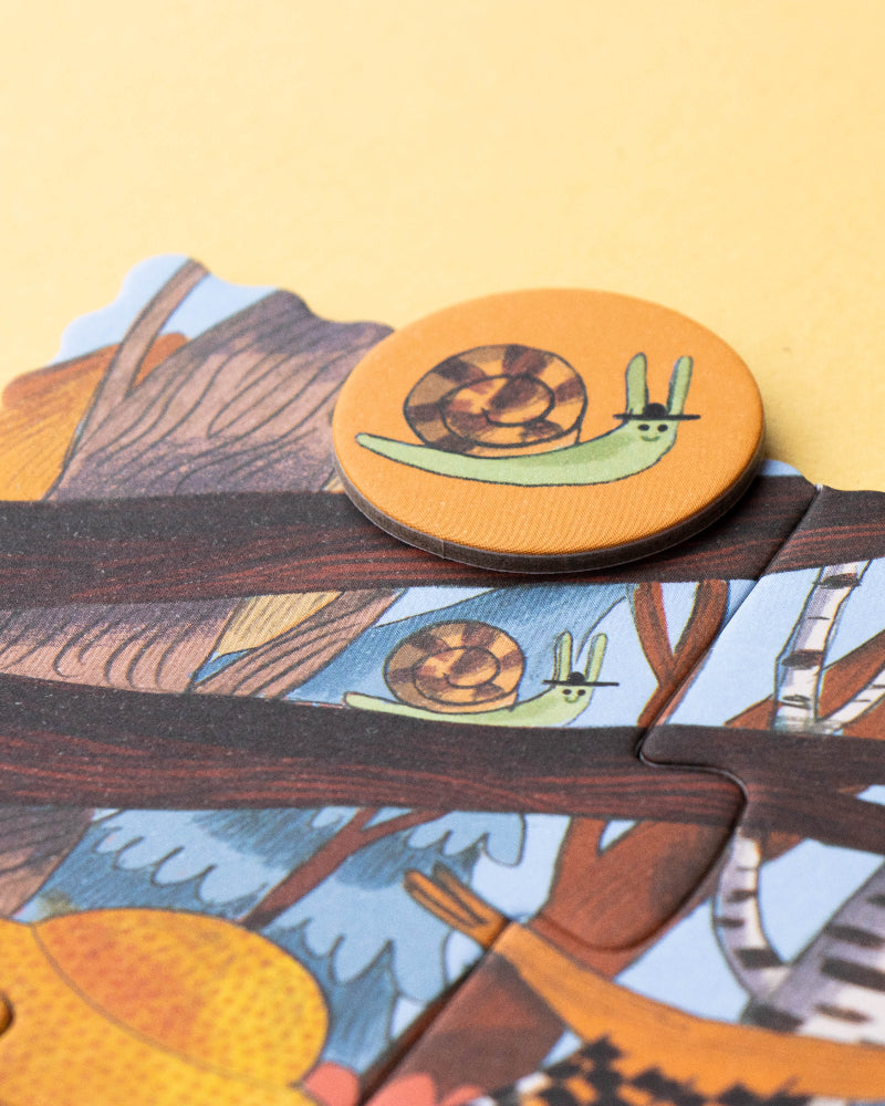 Children's puzzle with animal illustrations on a yellow background