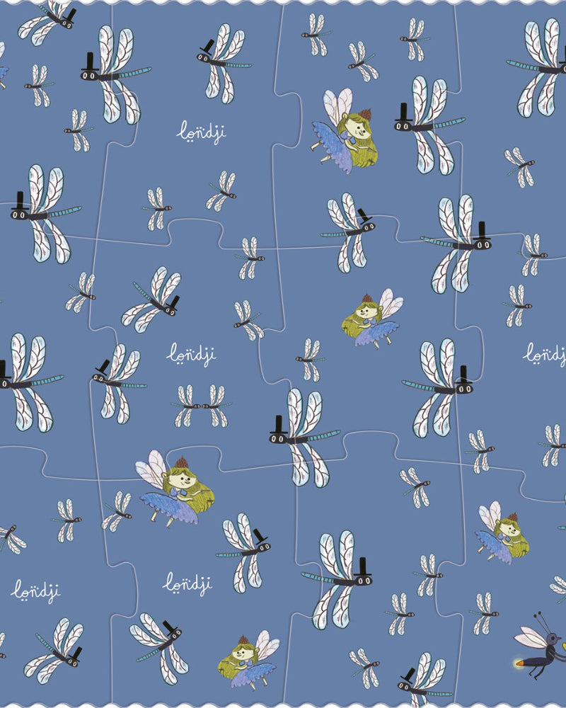 Pattern of dragonflies and flowers on a blue background