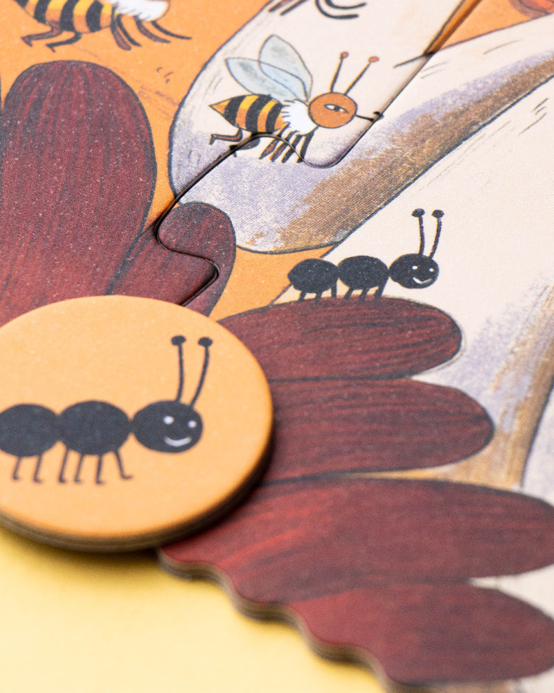 Wooden puzzle piece with an ant design on a colorful background