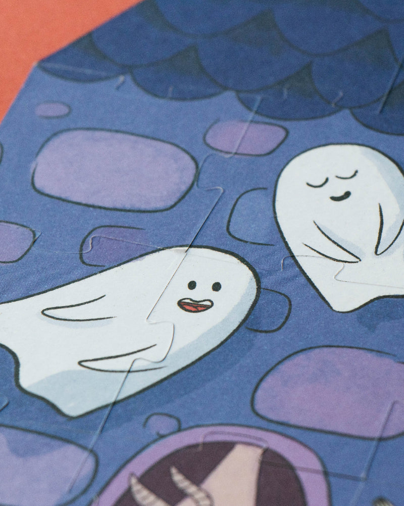 Illustration of two ghosts and a cat underwater with fish and bubbles.