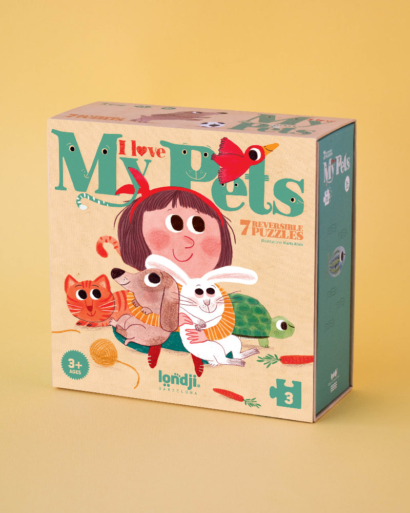 Children's puzzle box titled 'I Love My Pets' with colorful illustrations on a yellow background