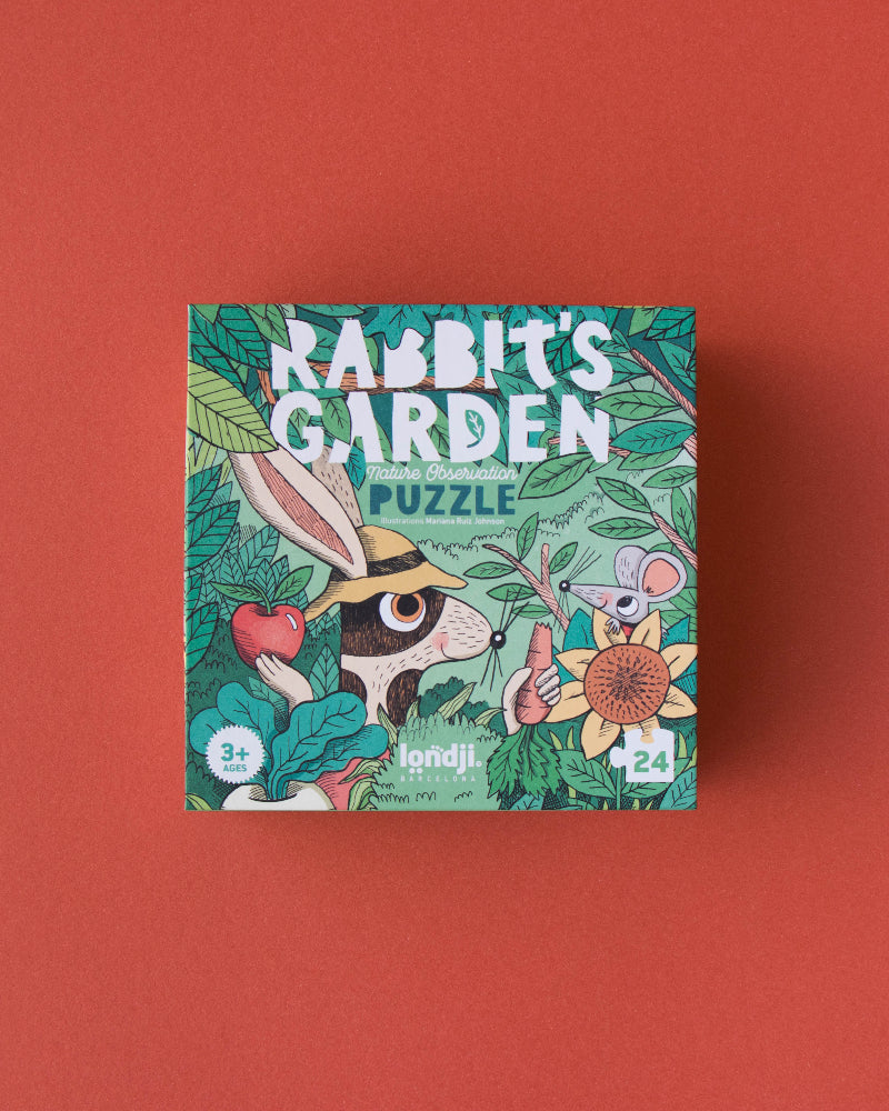 Box of 'Rabbit's Garden' puzzle on a red background