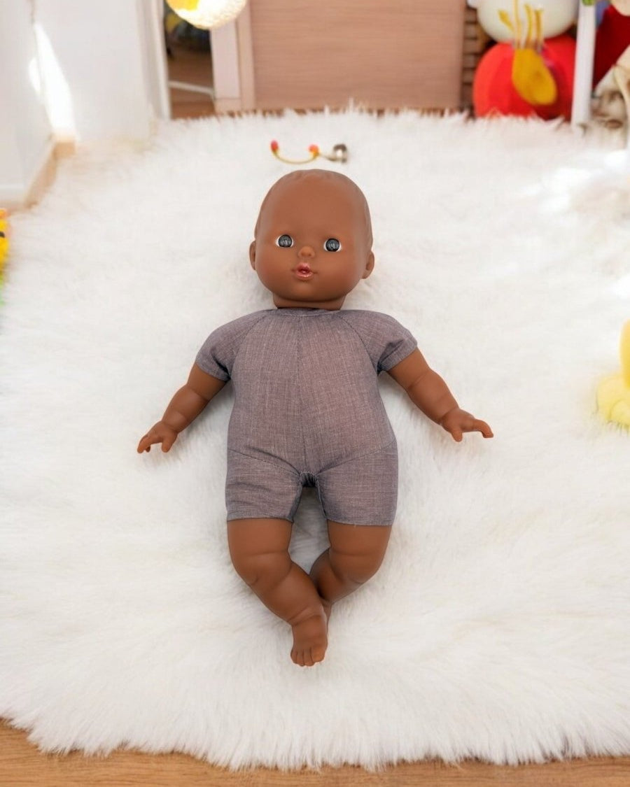 African American Doll on a rug