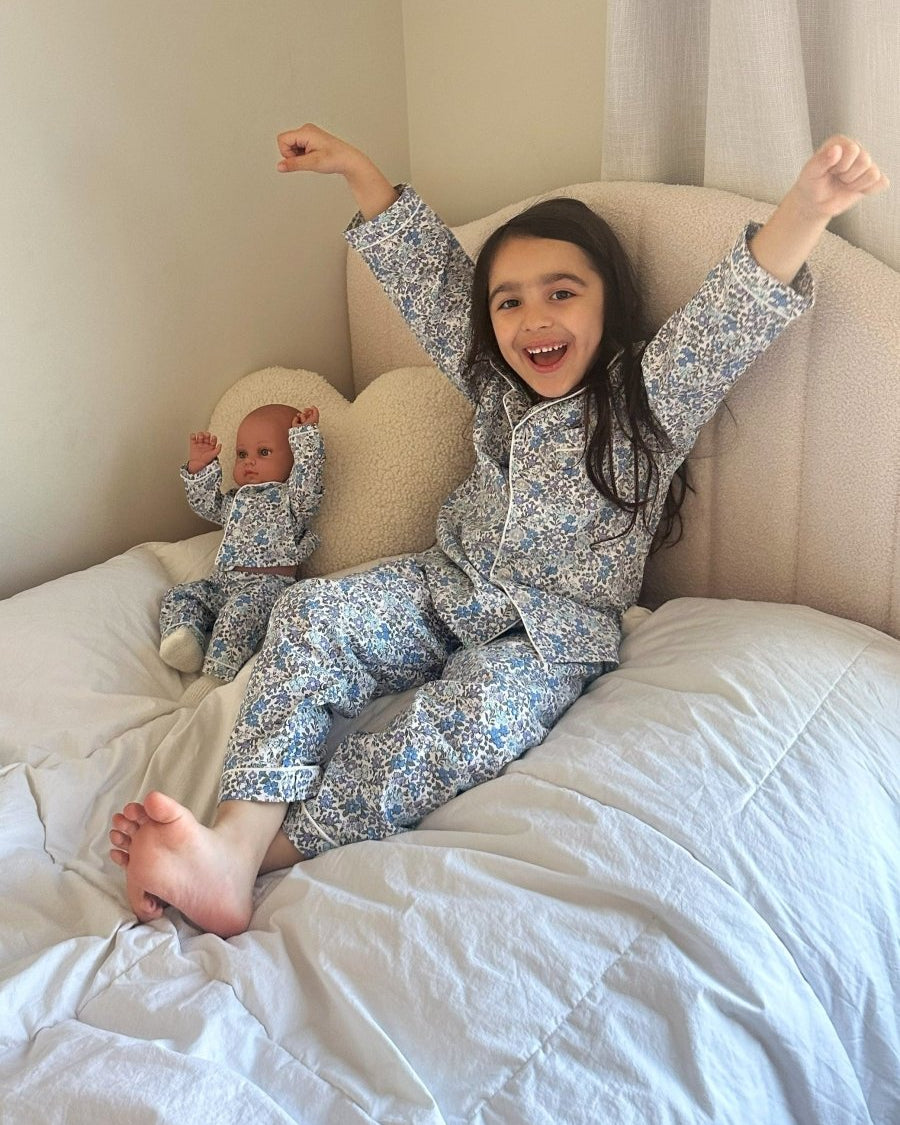 Handcrafted American girl doll clothes with detailed embroidery