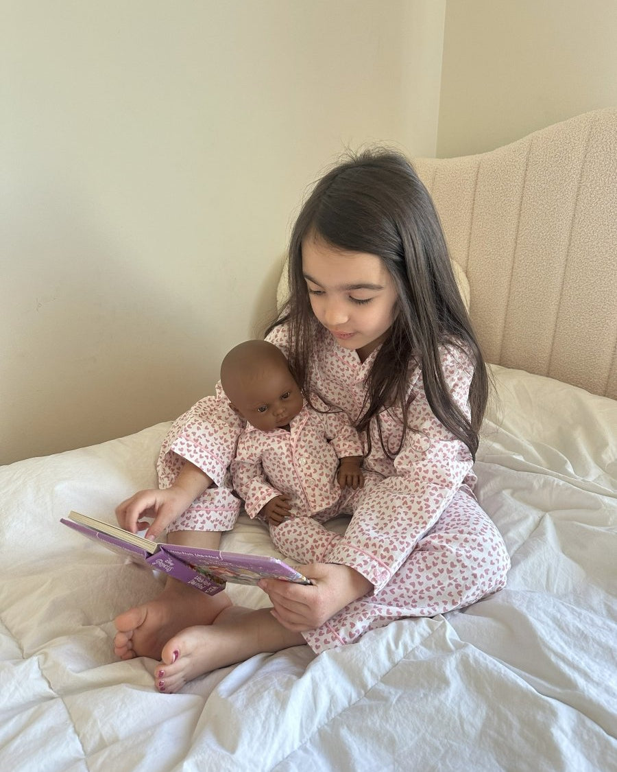 Valentine-themed doll outfits with heart details