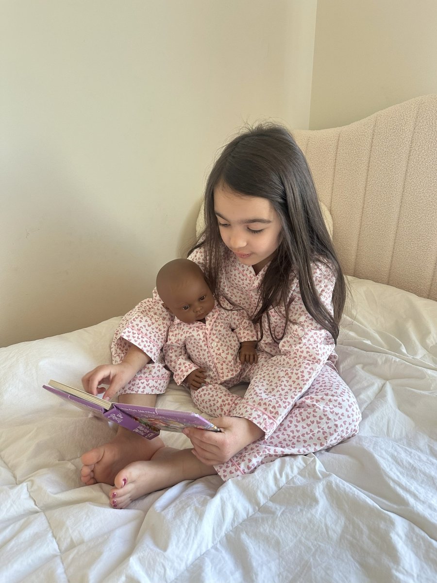 Valentine-themed doll outfits with heart details