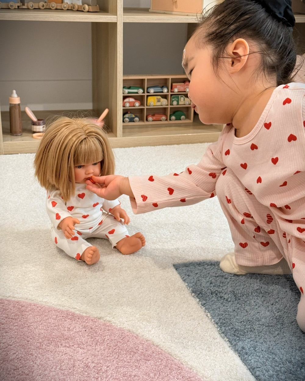 Polish-made doll clothes with red heart print matches Leni Romi Valentine Rose collection