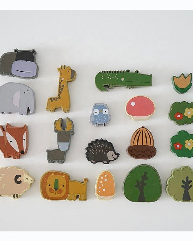 Complete set of wooden Montessori animal stacking blocks featuring colorful forest creatures and trees