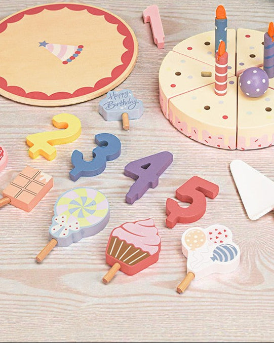Wooden birthday cake toy with 24 pieces including candles decorations and sliceable sections