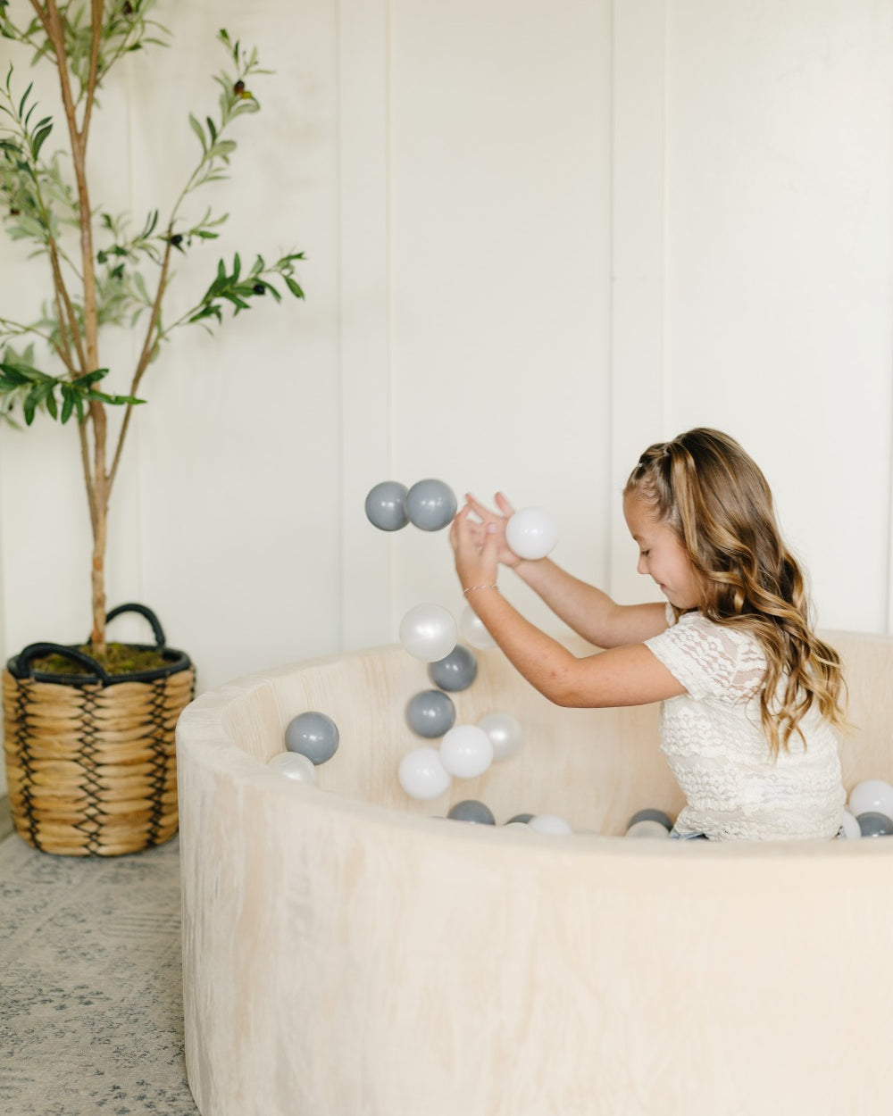 Older Girl in Ball Pit