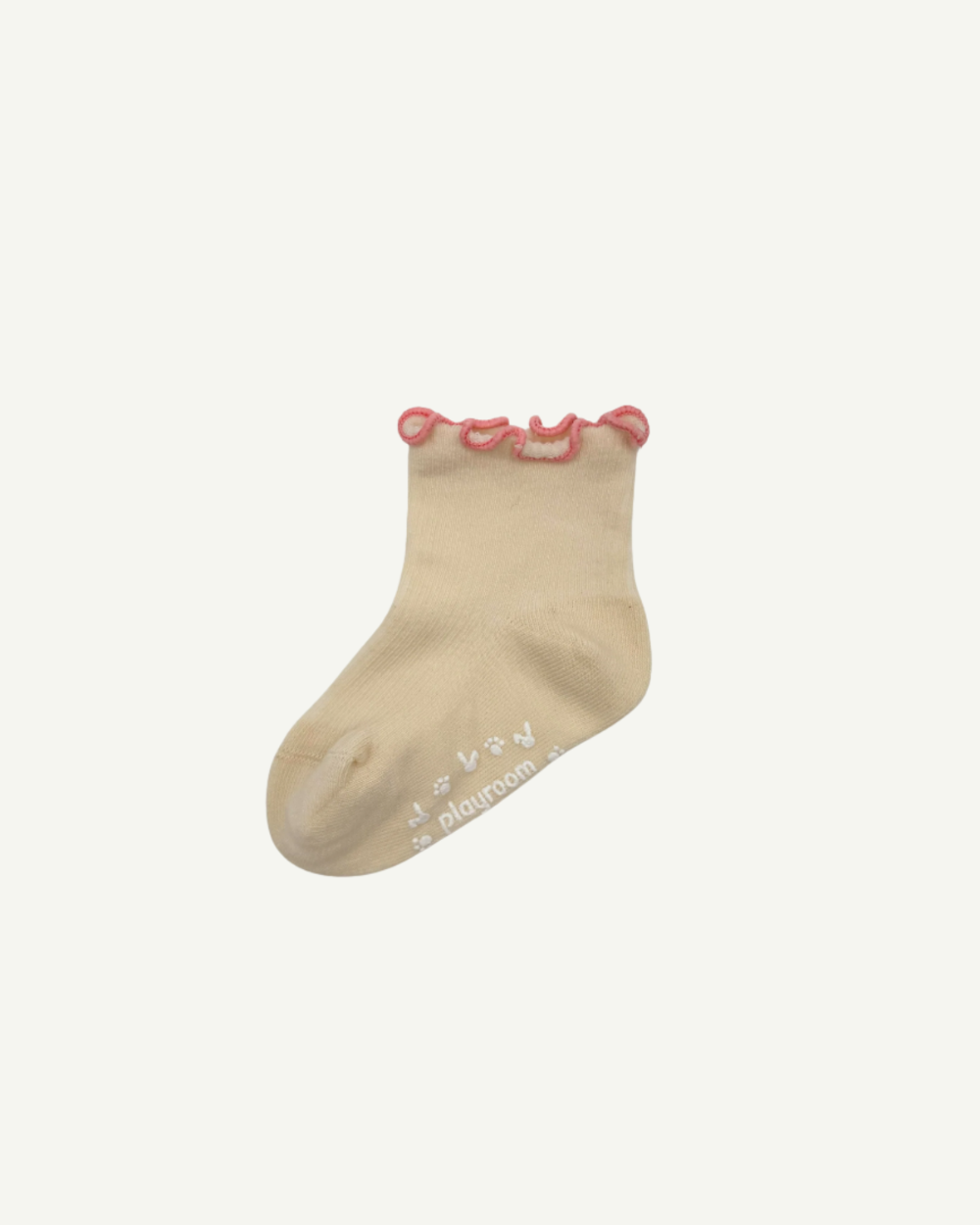 Petal pink ruffle socks for toddlers with grip soles and reinforced construction