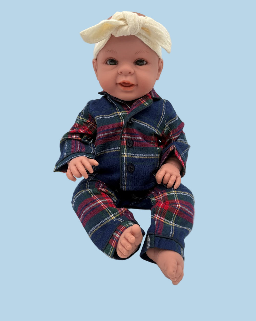 Matching Petite Plume doll pajamas featuring preppy navy tartan for elegant pretend play