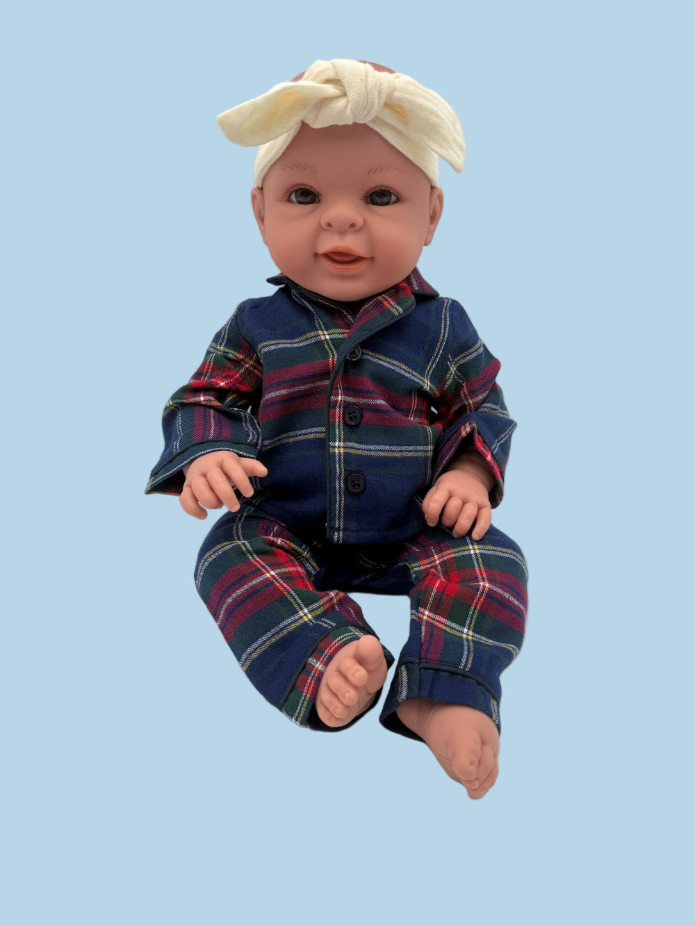 Matching Petite Plume doll pajamas featuring preppy navy tartan for elegant pretend play