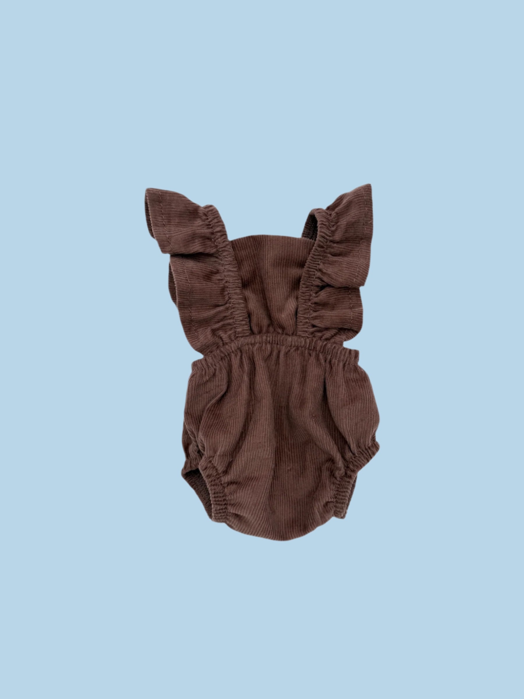 Doll clothes facilitating pretend caregiving scenarios