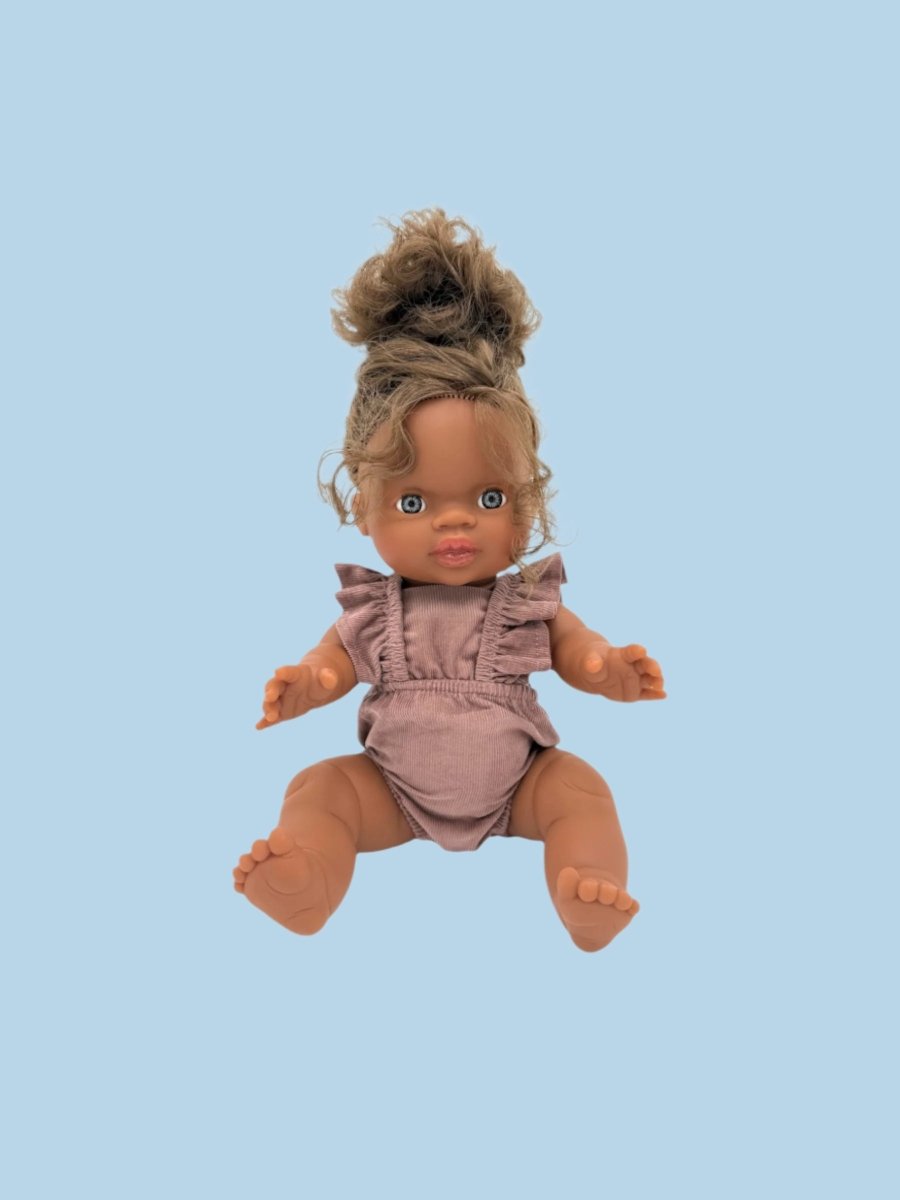 Doll clothes encouraging language development through play