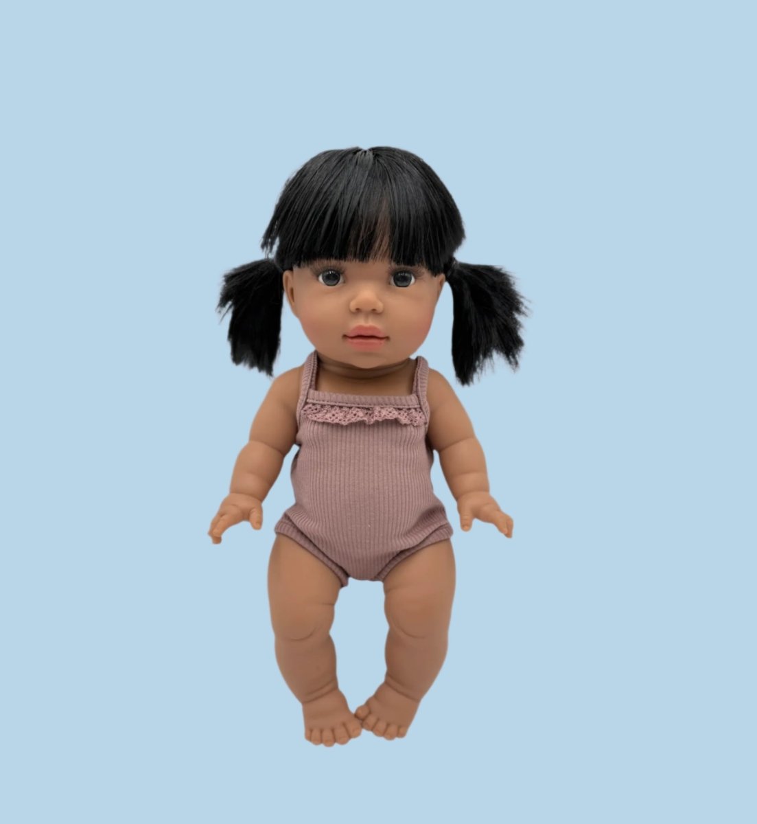 Doll wardrobe essentials in classic designs