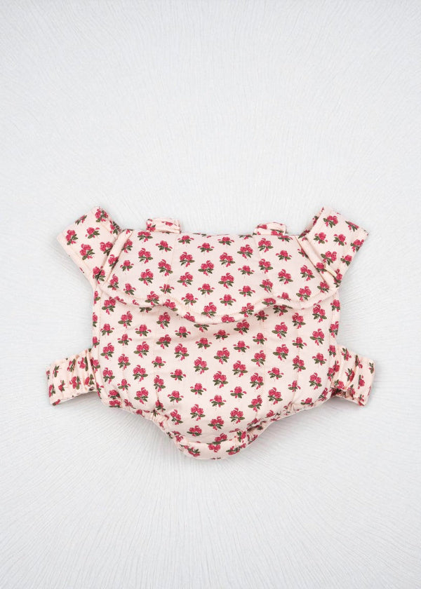 Rosie Rose doll carrier with vintage pink rose print fabric and comfortable scrunch straps for hands-free doll carrying