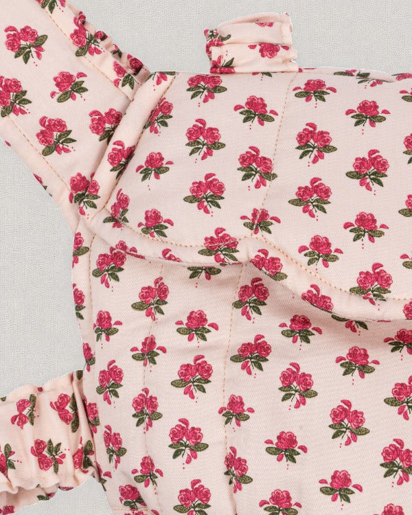 Close-up of Rosie Rose print fabric showing delicate pink roses with green leaves pattern and premium OEKO-TEX cotton construction