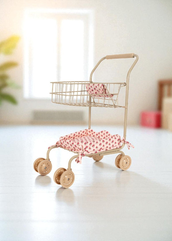 Ergonomic champagne-colored handles with comfortable grip designed for small hands during pretend play shopping adventures