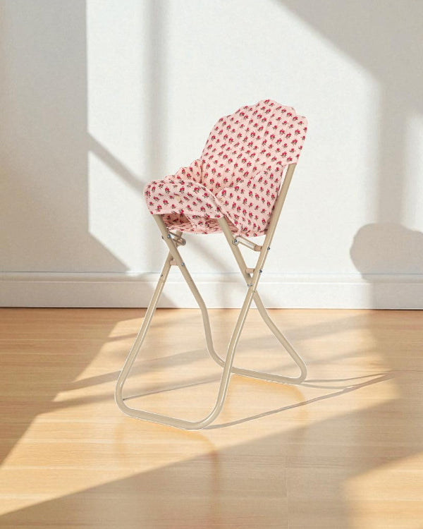 Beautifully arranged Rosie Rose doll high chair as thoughtful gift for encouraging realistic doll care and feeding play