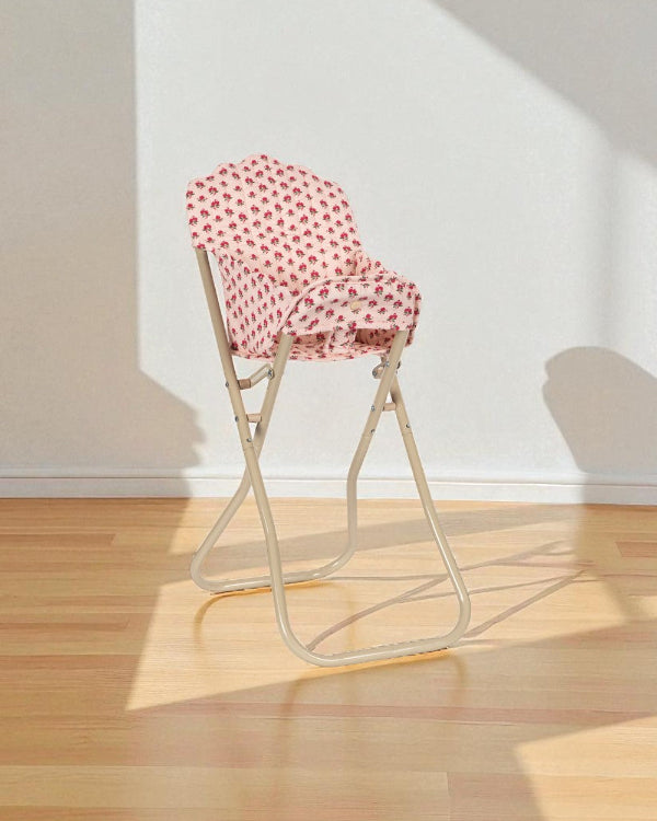 Durable champagne metal frame of doll high chair showing professional-grade folding mechanism and stable base design