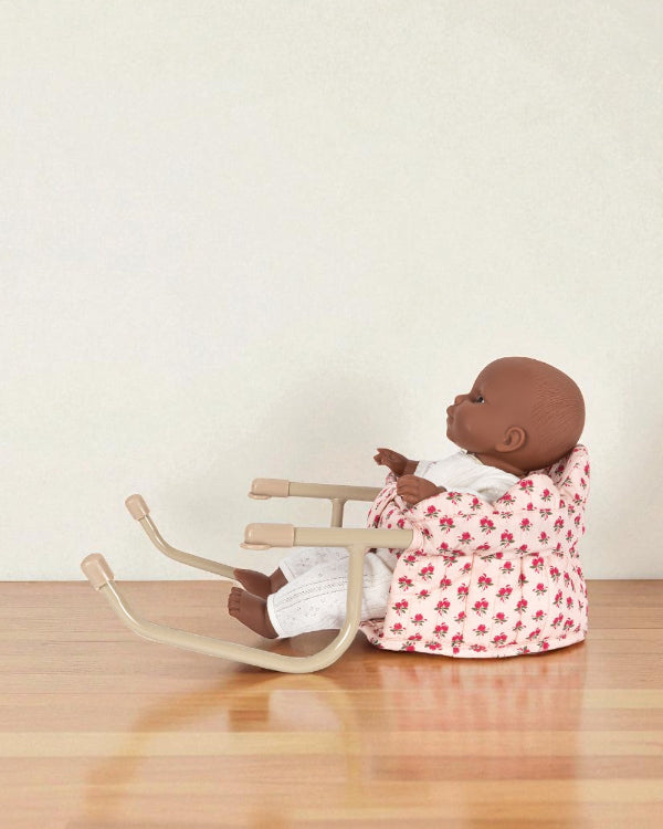 Side view of rose print table chair showing comfortable padded backrest and proper seating angle for realistic doll dining