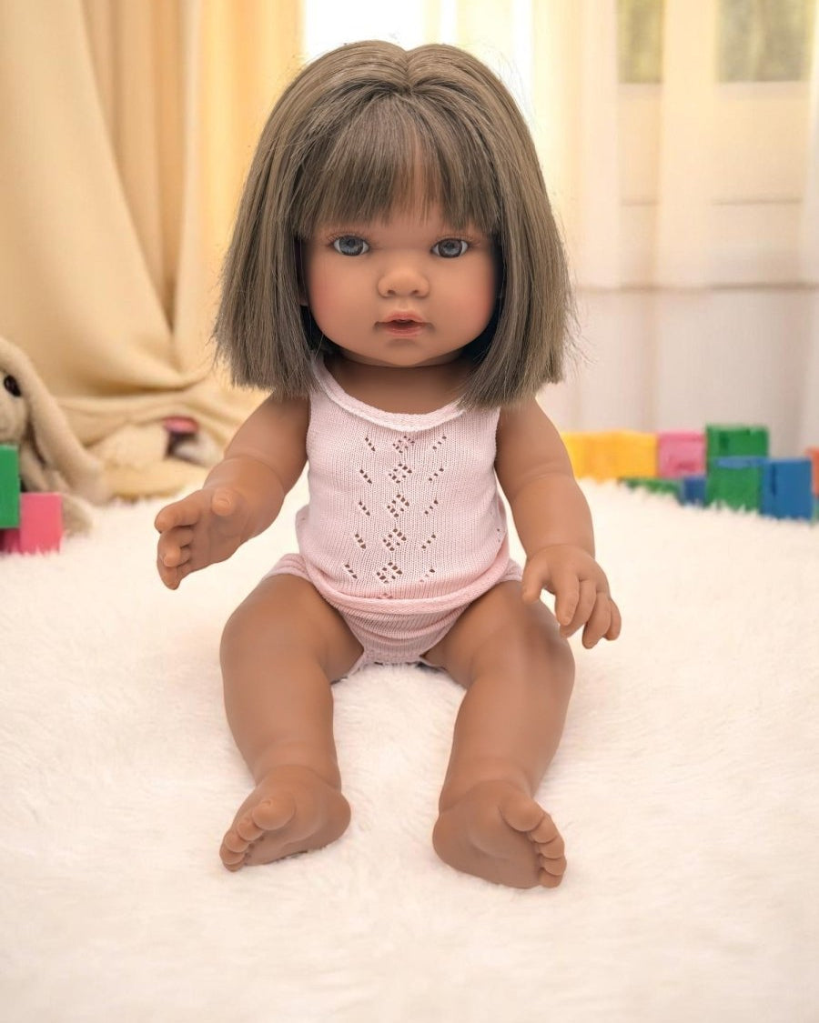 Savannah diverse baby doll with straight brunette hair and rich skin tone for inclusive developmental play