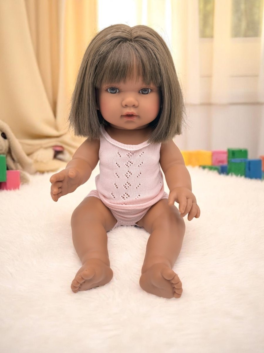 Savannah diverse baby doll with straight brunette hair and rich skin tone for inclusive developmental play