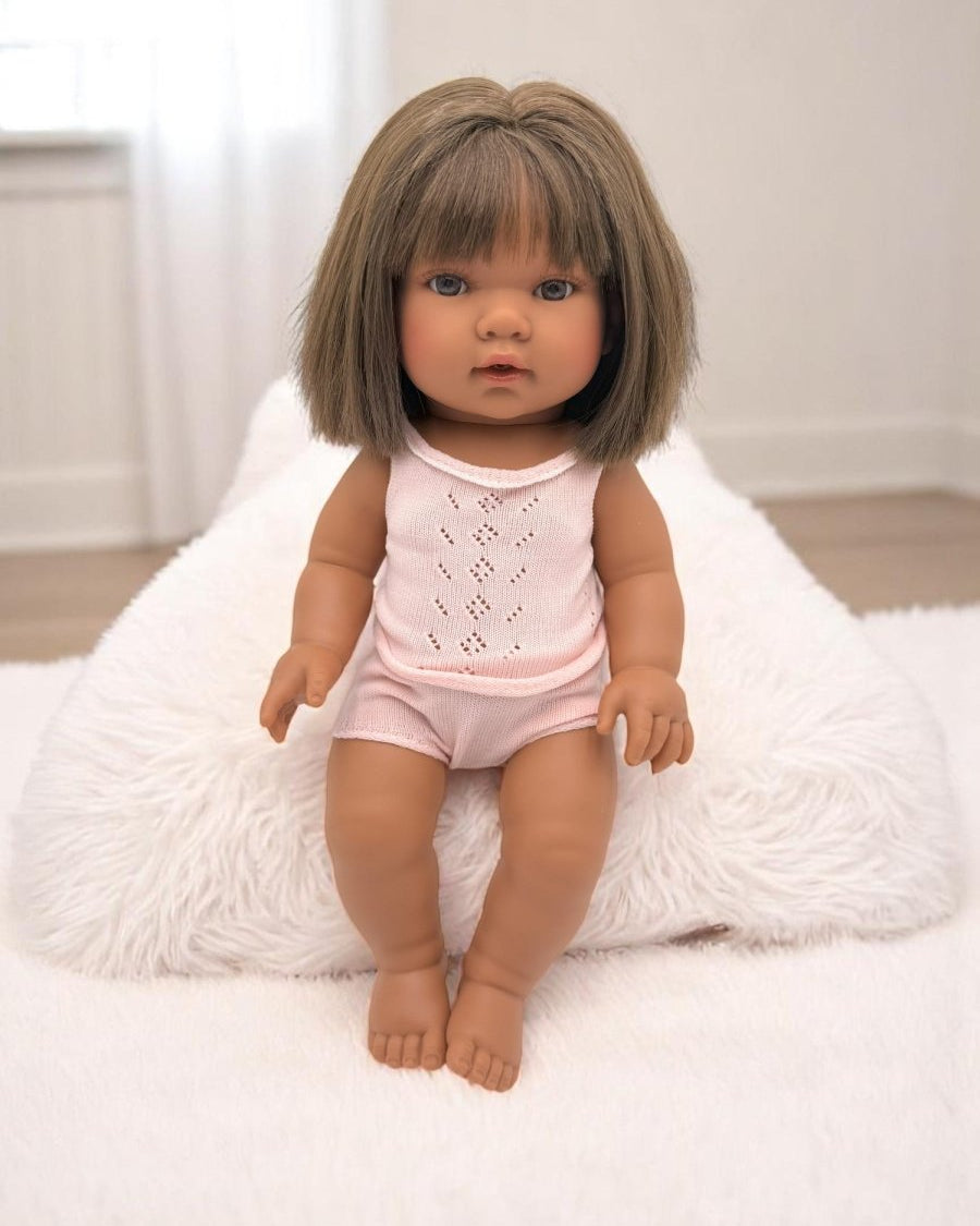 Real life baby doll Savannah featuring multicultural representation perfect for children's playroom diversity