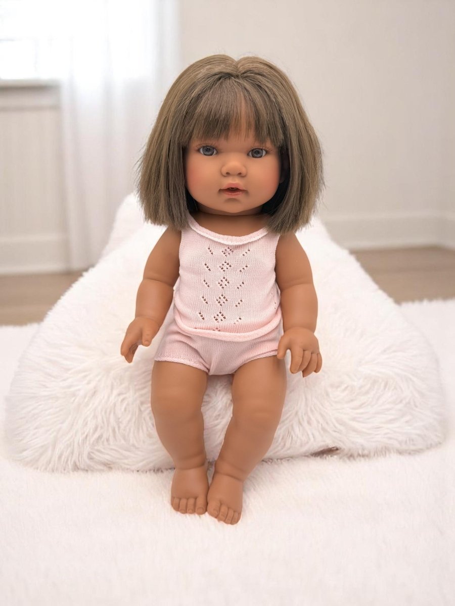 Real life baby doll Savannah featuring multicultural representation perfect for children's playroom diversity