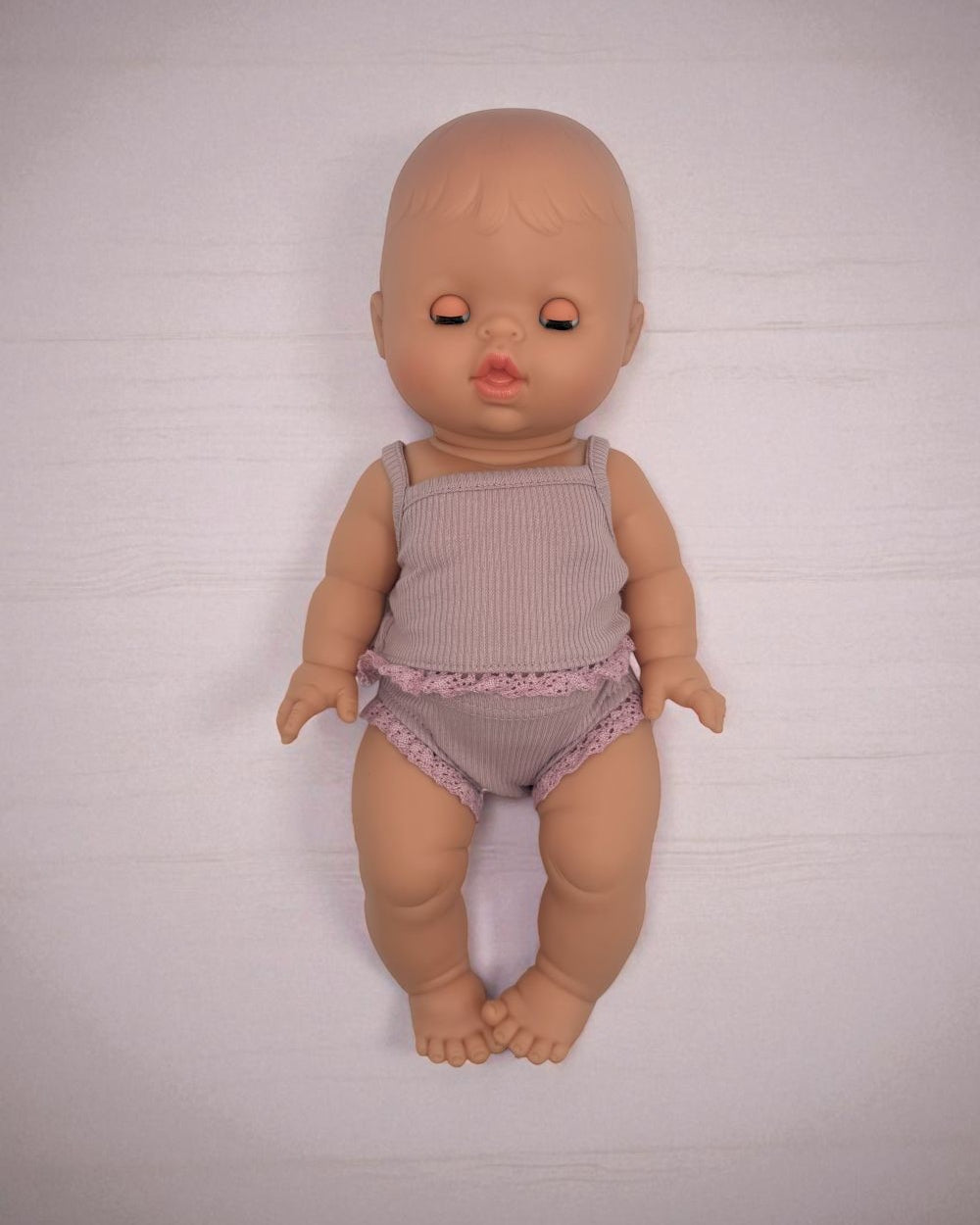 Baby girl doll with closing eyes Minikane hard body articulated limbs 13 inch