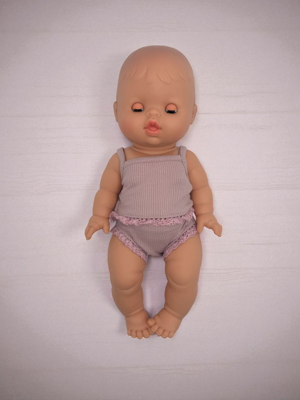 Baby girl doll with closing eyes Minikane hard body articulated limbs 13 inch
