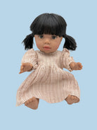 Handcrafted doll clothes in neutral linen fabric