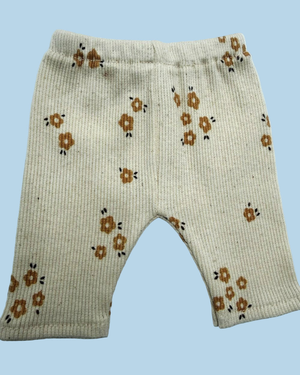 Complete doll sweatshirt and pants outfit in soft Caramel Petals print for pretend play