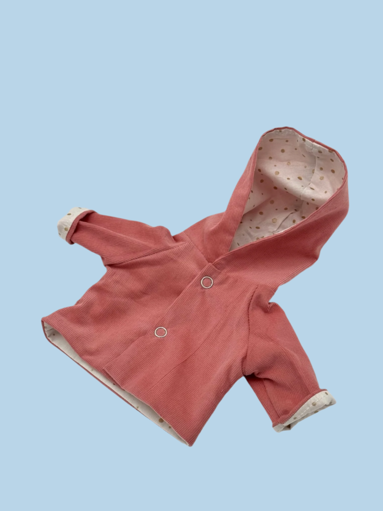 Doll jacket with seasonal design elements