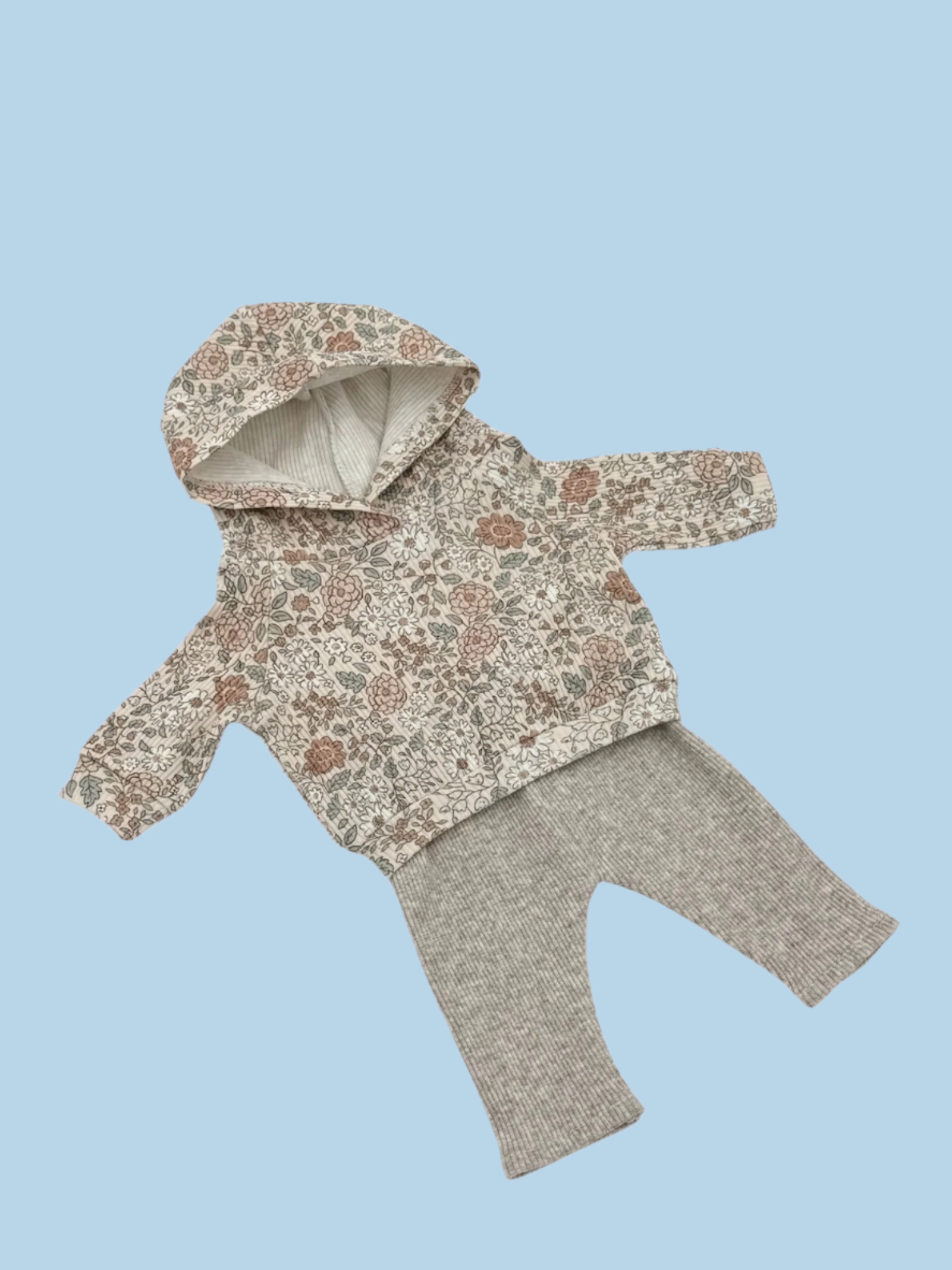 Doll wardrobe for therapeutic play activities