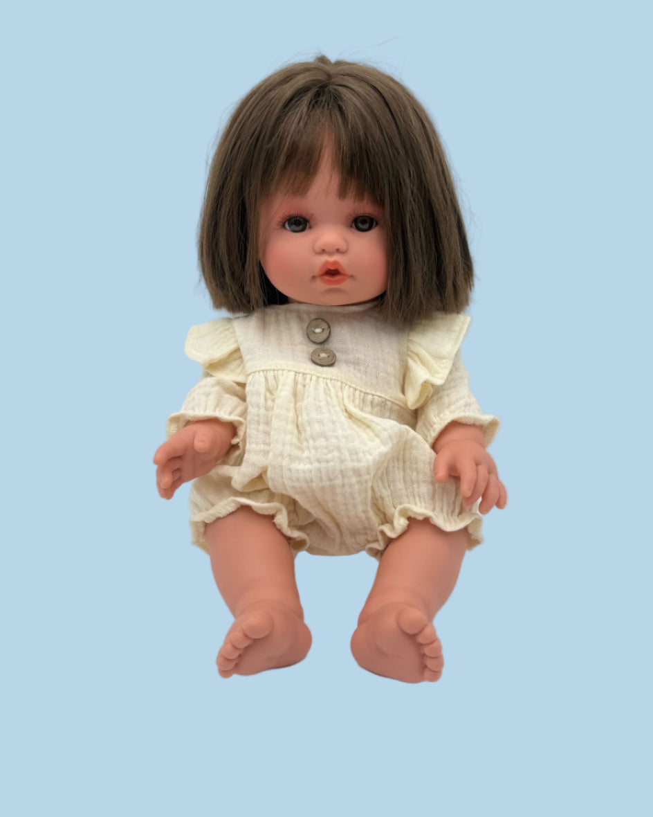 Heirloom-style doll outfit in soft butter yellow muslin with bloomer legs and gathered sleeves