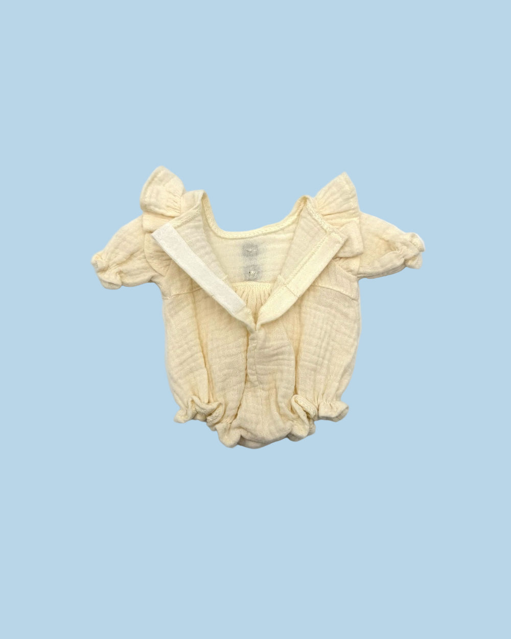 Classic flutter sleeve doll romper in vanilla cream with gathered bloomer-style legs