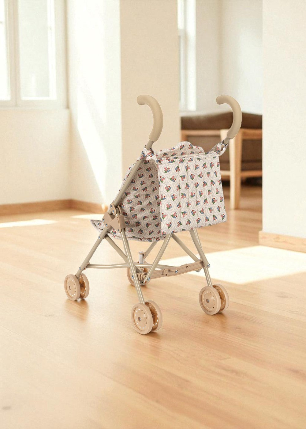 Full view of cream-colored doll stroller in Verona Blues pattern with storage basket